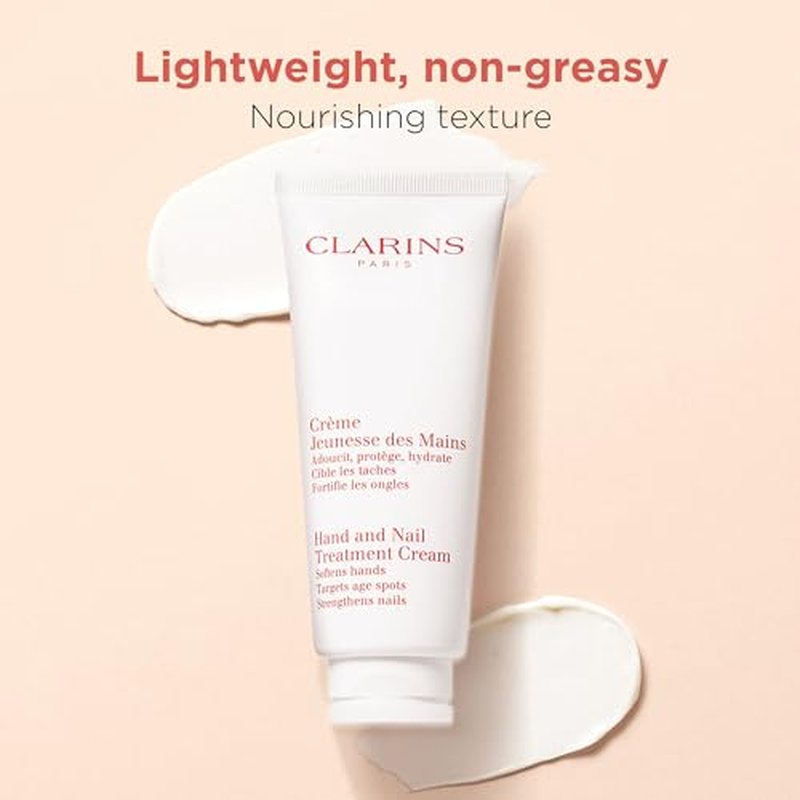 Clarins Hand and Nail Treatment Cream | Award-Winning | Softens, Nourishes and Shields Skin | Strengthens Nails and Conditions Cuticles | Natural Plant Extracts, Including Shea Butter