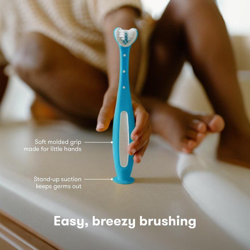 Frida Baby Triple-Angle Toothhugger Training Toddler Toothbrush | Toddler Toothbrush 2 Years and Up, Cleans All Sides at Once | Blue