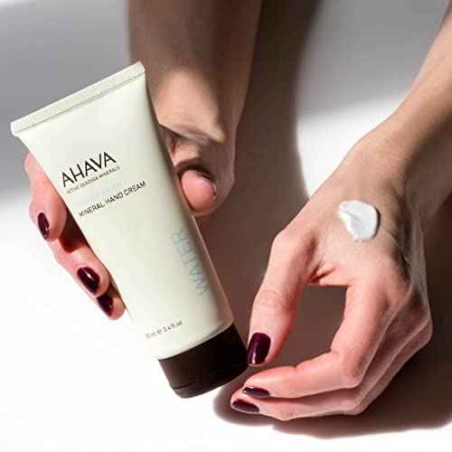 AHAVA Dead Sea Water Mineral Hand Cream - Hand Moisturizer For Dry Cracked Hands, Light & Fast Absorbing, Enriched with Exclusive blend Osmoter, Smoothing Witch Hazel & Soothing Allantoin