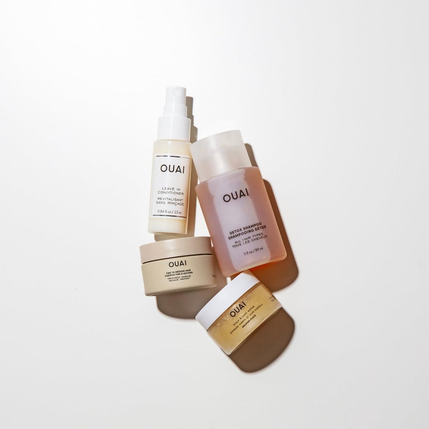 OUAI Travel Kit - Includes Travel Size Leave In Conditioner, Detox Shampoo, Thick Hair Mask, Scalp & Body Scrub (4 Count)