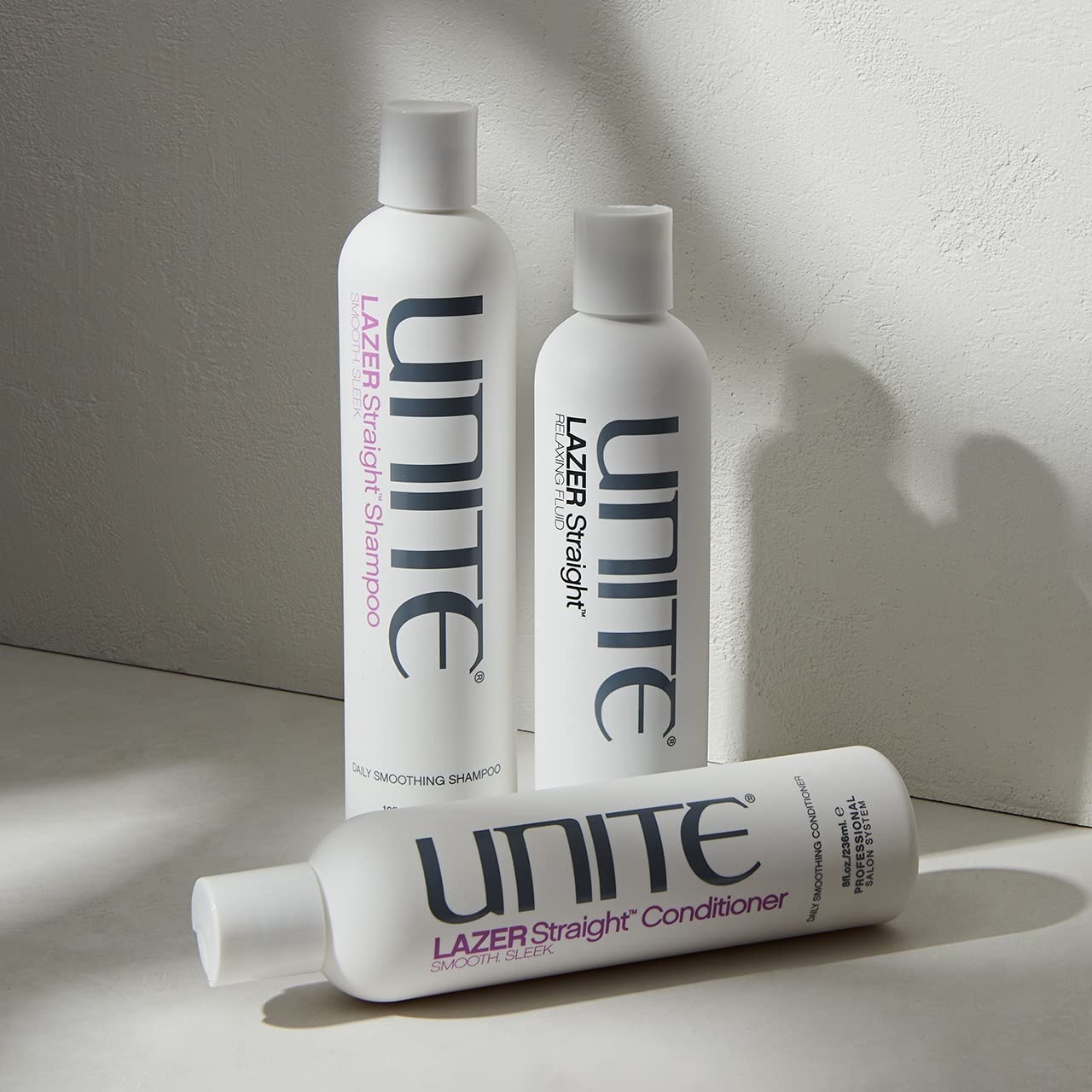UNITE Hair – LAZER Straight Relaxing Fluid – Anti-Humidity Styling Fluid to Smooth, Straighten & Control Frizz – Thermal Protection – 8 Fl Oz