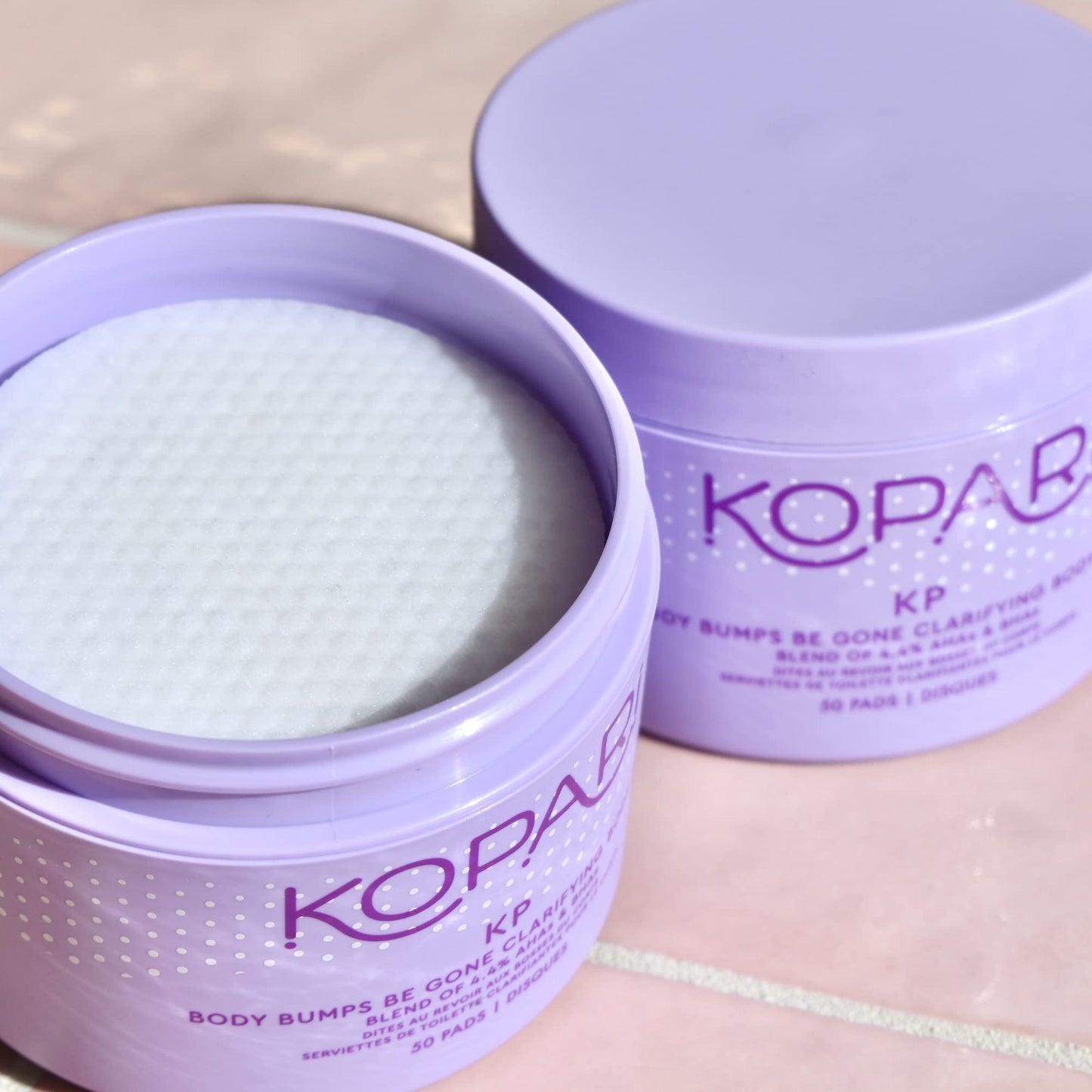 Kopari KP Body Bumps Be Gone Clarifying Body Pads with 4.4% AHAs & BHAs | Reduces the Appearance of Pores and Bumps | Brighten Dark Spots & Smooths Skin Texture | 50 Pads