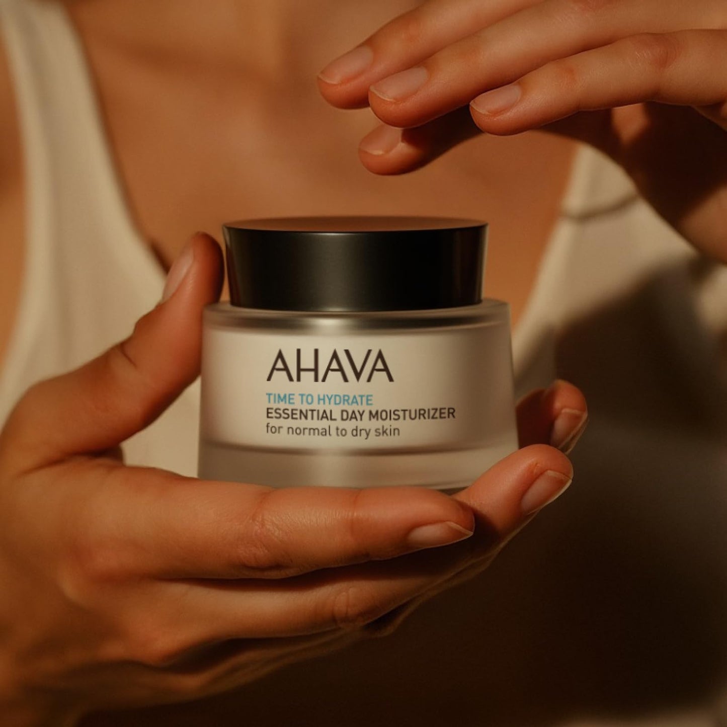 AHAVA Essential Day Moisturizer, Normal to Dry Skin - Essential Daily Hydrating Facial & Neck Cream, Anti-Aging & Smoothing Effect, Enriched with Osmoter, Aloe Vera, Allantoin & Vitamin E, 1.7 Fl.Oz