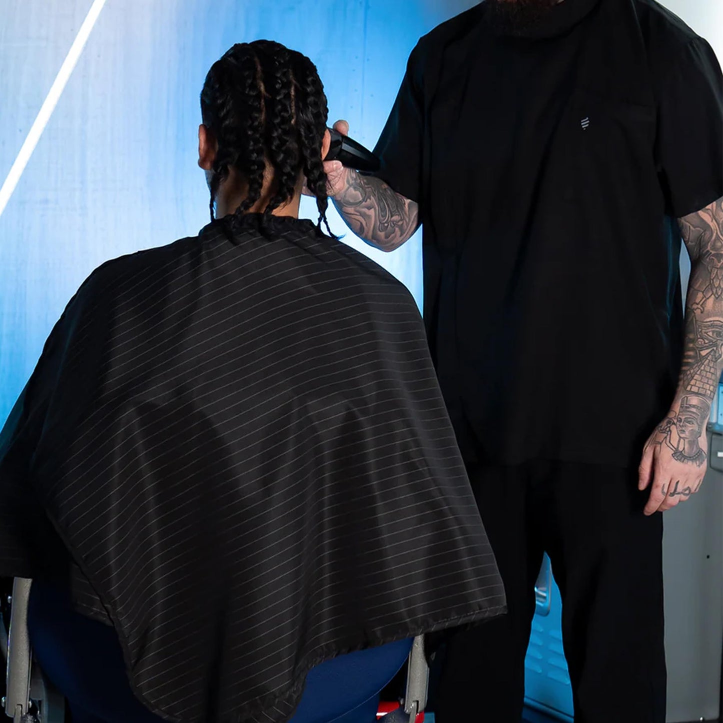 Barber Strong The Barber Cape, Hair Repelling and Static-Reducing Material, Flexible Elastic Neckband for Comfort, Water Resistant Fabric, Oversized for Complete Coverage, Black/White Stripe, 55 x 65"