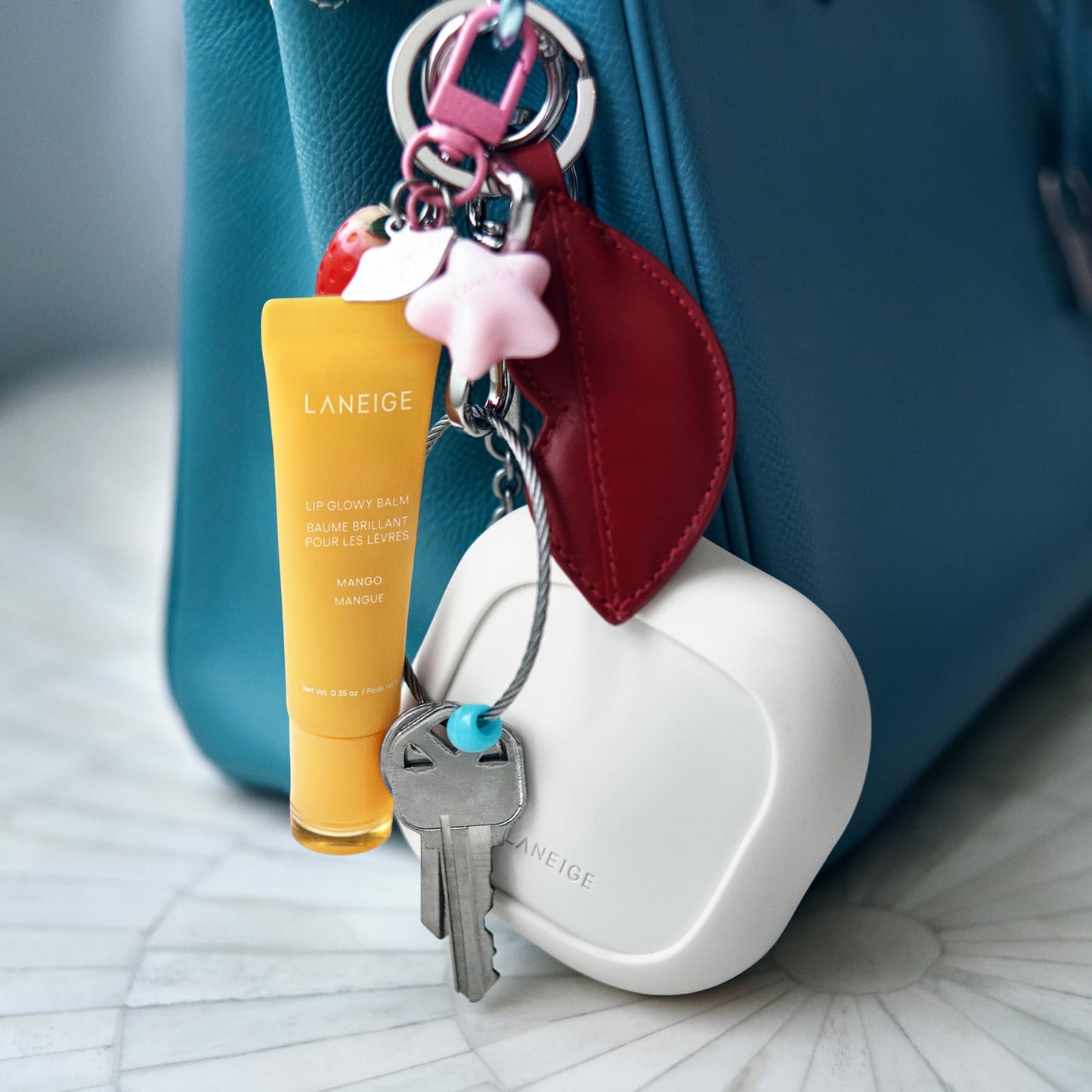 LANEIGE Neo Powder Keychain: Travel-Friendly Silicone Sleeve & Silver Ring for On-the-Go Touch Ups