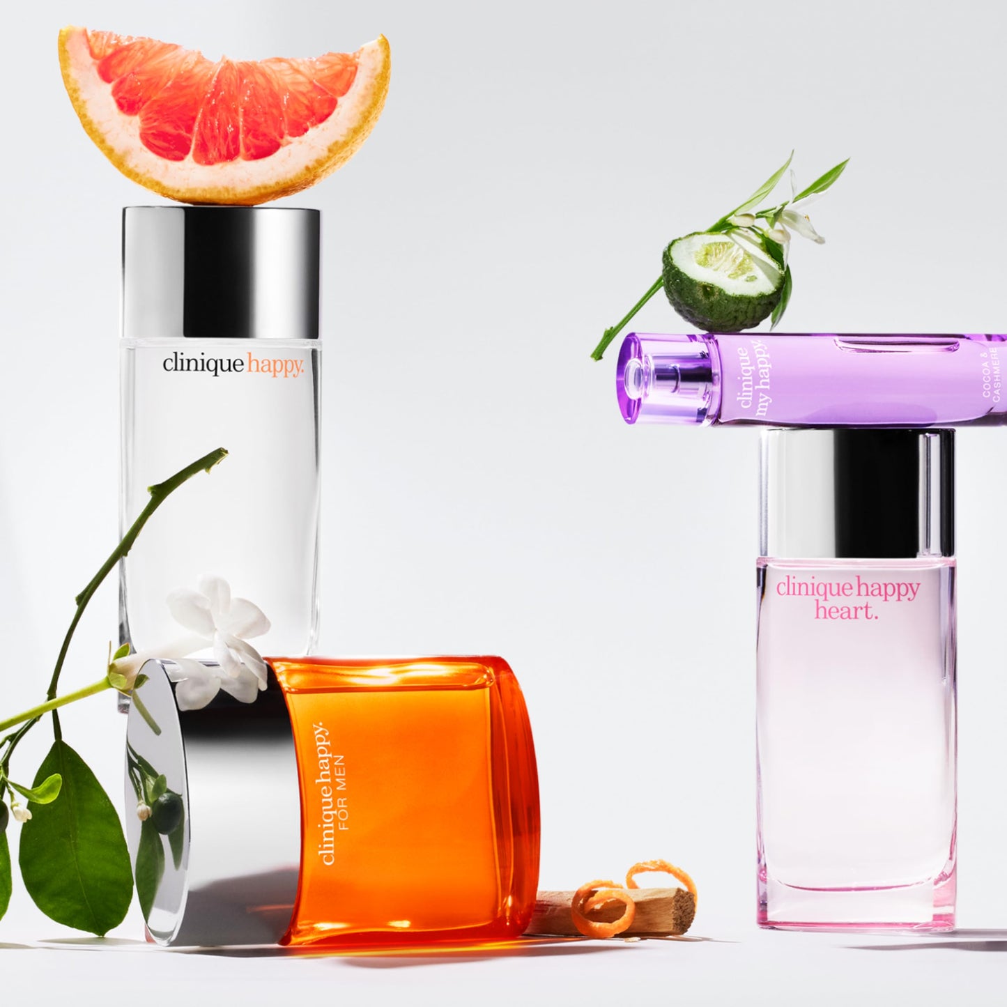 Clinique Happy Eau de Parfum Spray | Notes of Grapefruit, Bergamot, Hawaiian Wedding Flower + Spring Mimosa | Perfumes for Women, Mini Travel Size, 0.34 Fl Oz