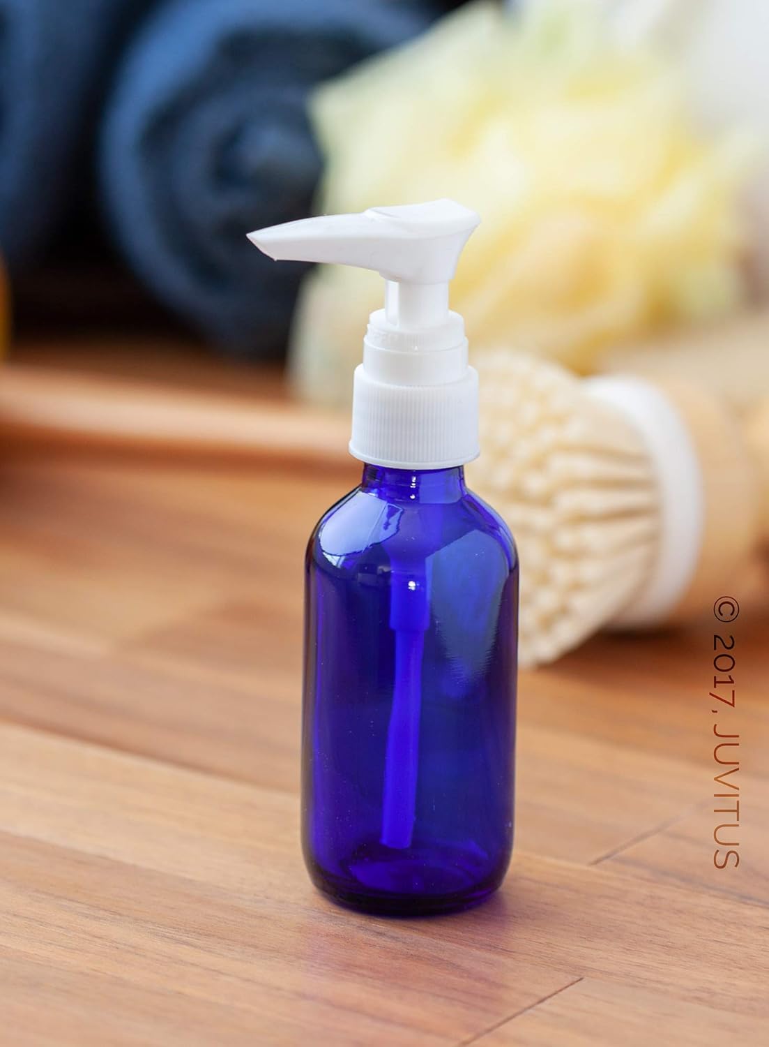 Blue Cobalt Glass Boston Round Bottles - 2 oz with White Lotion Pump | 12 Pack