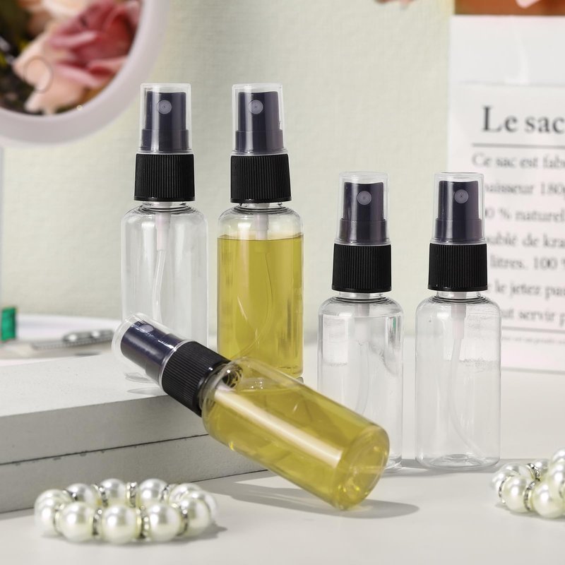 Maxcheck 100 Pcs Mini Clear Spray Bottles 1 oz Plastic Empty Travel Bottle Fine Mist Small Spray Containers with 5 Pcs Funnels Refillable Liquid Travel Container for Perfume Skin Toner (Black)