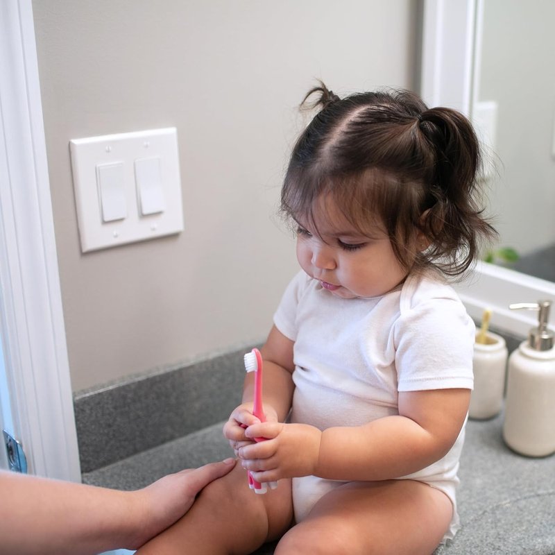 Dr. Brown's Infant-to-Toddler Toothbrush - Cute Elephant Design | Pink, 0-3 Years