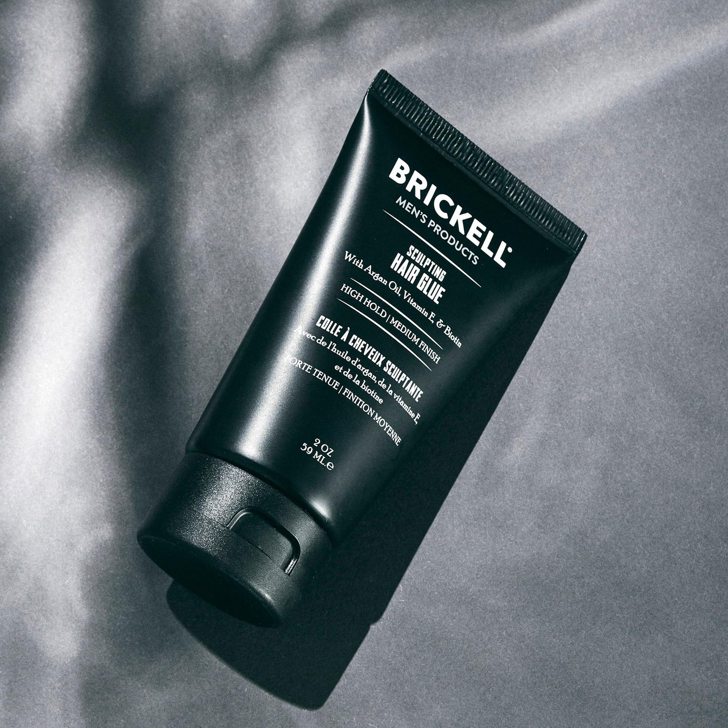 Brickell Men's Hair Styling Sculpting Hair Glue For Men, All Day Lasting Hold for Sculpting and Shaping Hair, With Argan Oil, Vitamin E, and Aloe, 2 Ounce, Scented