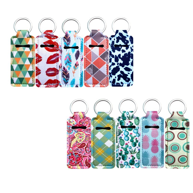 PUEZOKLY 40pcs Travel Bottles Keychain Set with Wristlet Chapstick Holders keychain Hand Sanitizer Holder Key chain with Empty Bottles