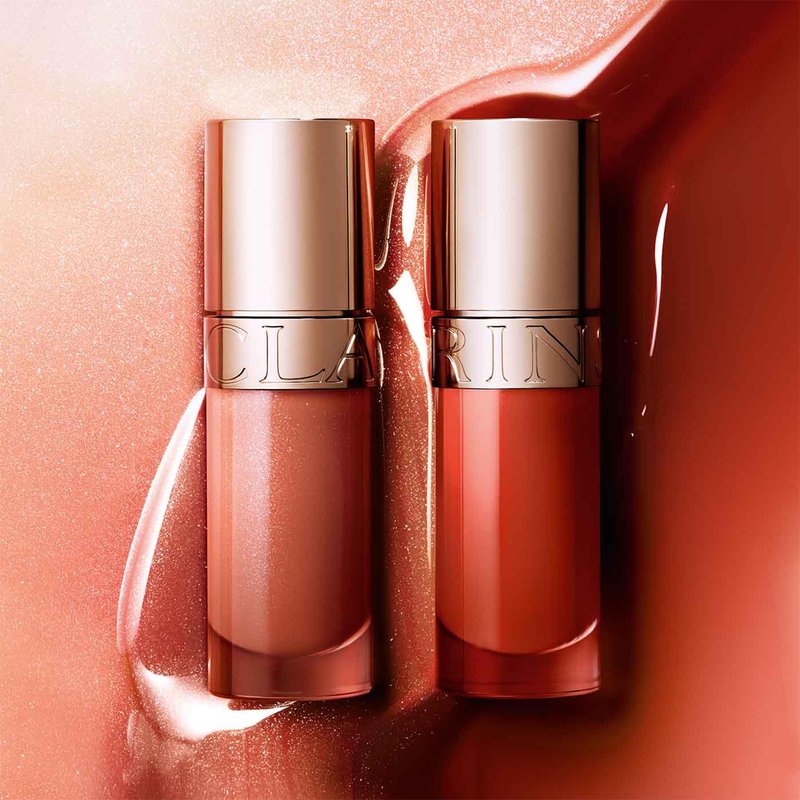 Clarins Lip Comfort Oil | Hydrating, Nourishing and Moisturizing Lip Oil | Sheer, High Shine Finish | Soothes, Comforts and Protects Lips | Visibly Plumps | 93% Natural Ingredients | 0.2 Ounces