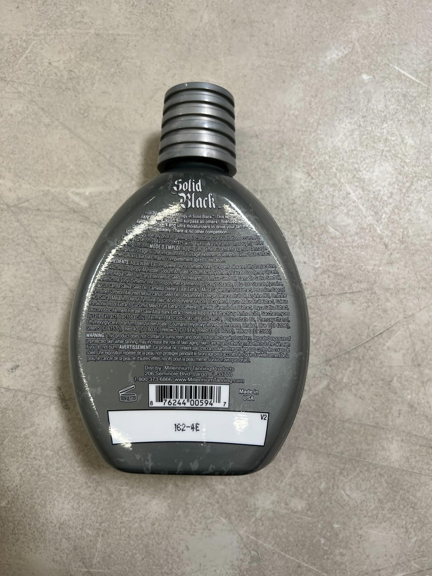 Millennium Tanning SOLID BLACK 100X Dark Tanning Lotion Indoor Outdoor Bronzer Tanning Bed Lotion 13.5 fl. oz. 2-PACK