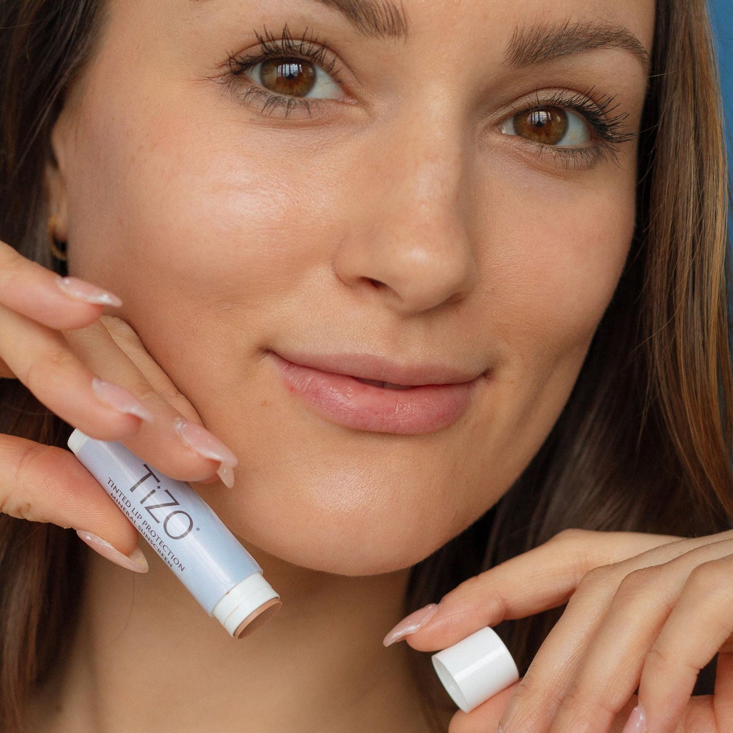 TiZO Lip Protection | Tinted | Broad Spectrum Sunscreen | UVA/UVB Protection | For all skin types | Titanium Dioxide and Zinc Oxide | 0.14 oz / 4.5 g