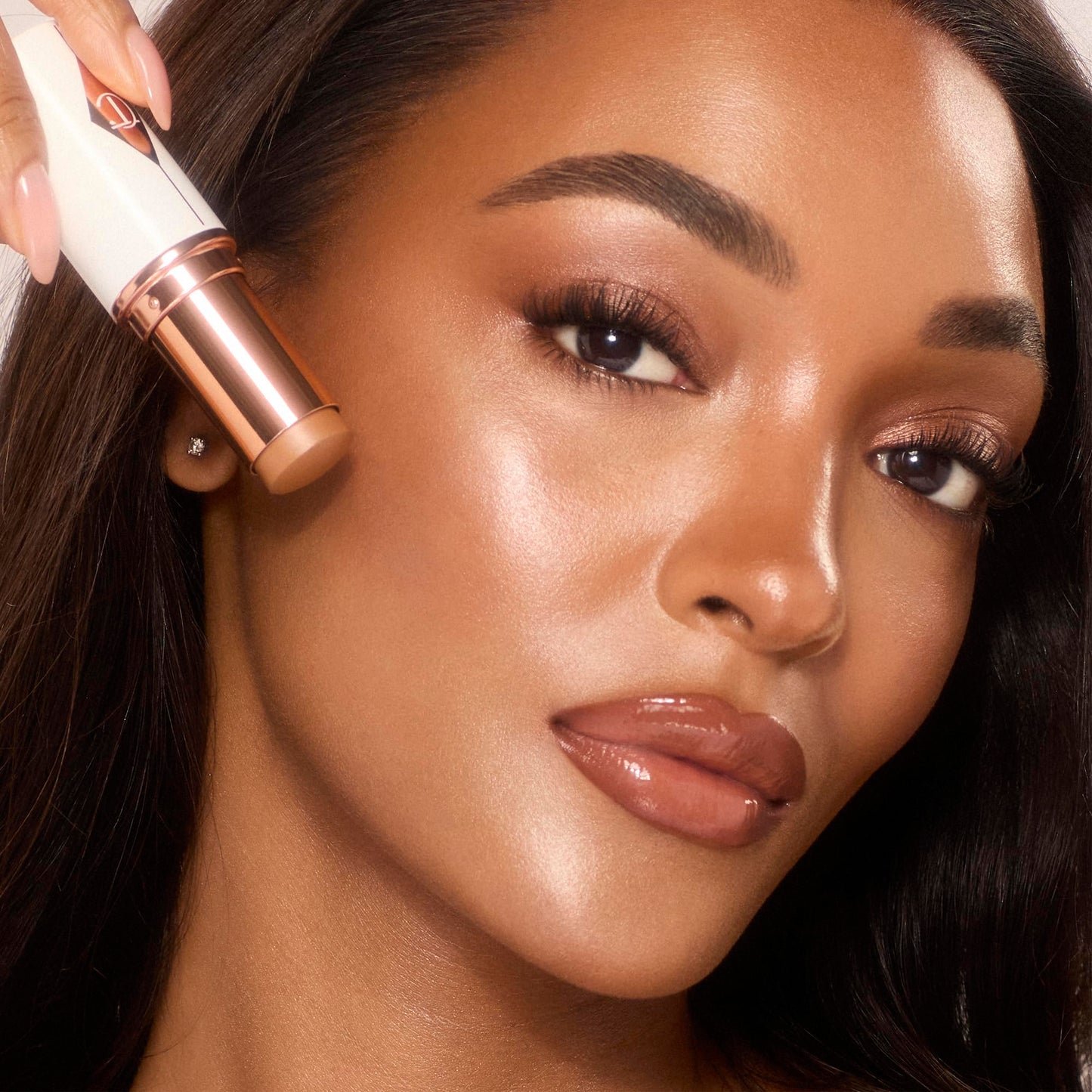 Charlotte Tilbury Unreal Skin Tint & Sheer Glow Hydrating Foundation Stick - Cream Foundation Makeup with Sheer-to-Light Coverage & a Buildable Formula - Blurring, Smoothing & Nourishing - 10 Tan